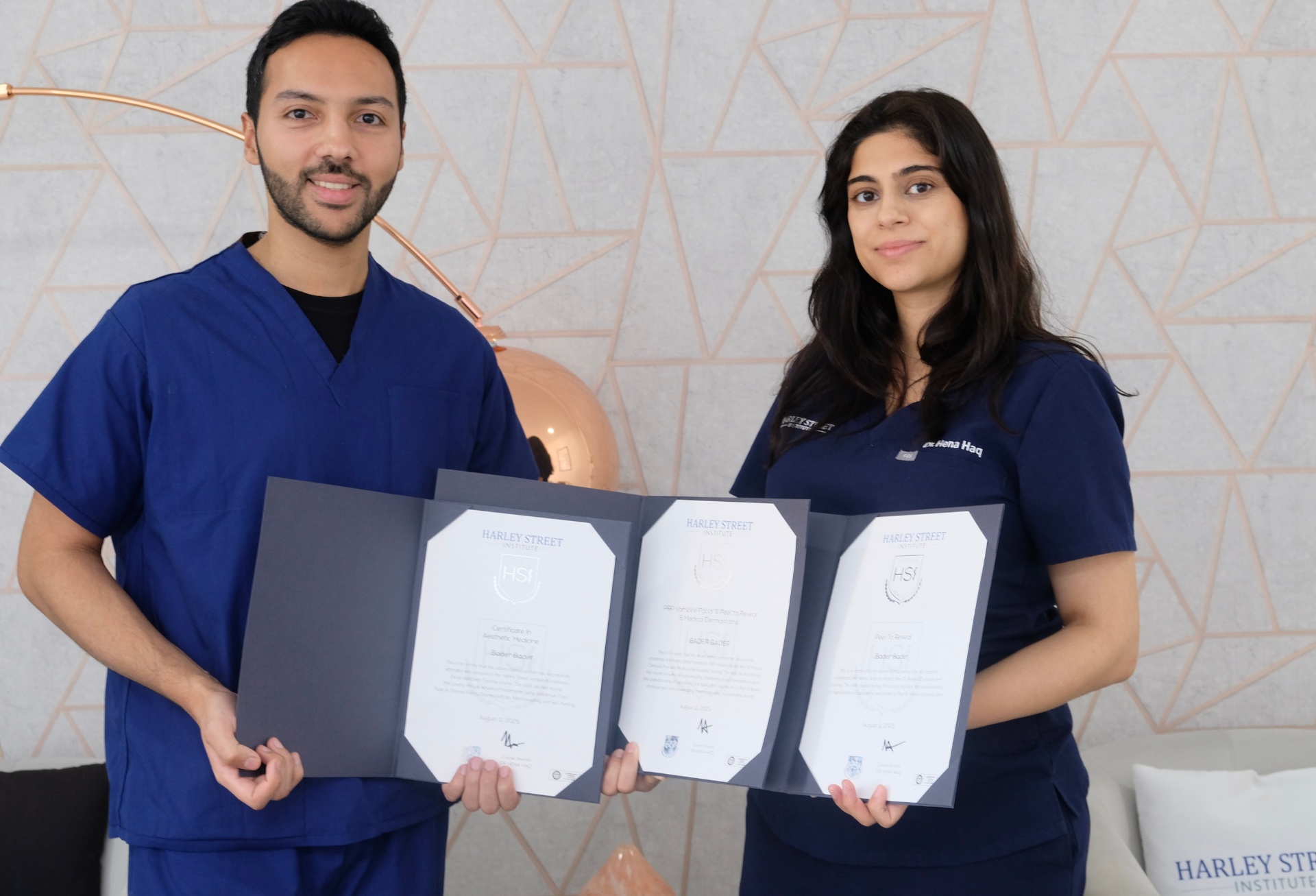 Harley Street Institute Fellowship Programme Graduates Fellowship graduates in aesthetic medicine holding certificates at Harley Street Institute